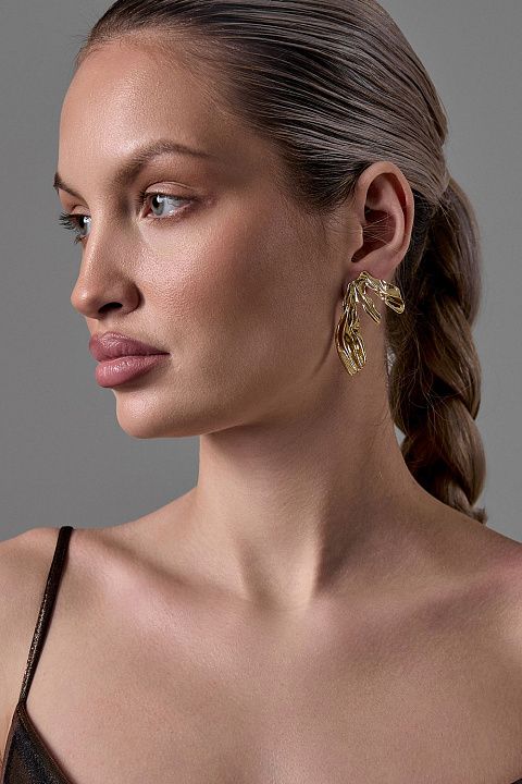 Золотистые асимметричные серьги-ветви